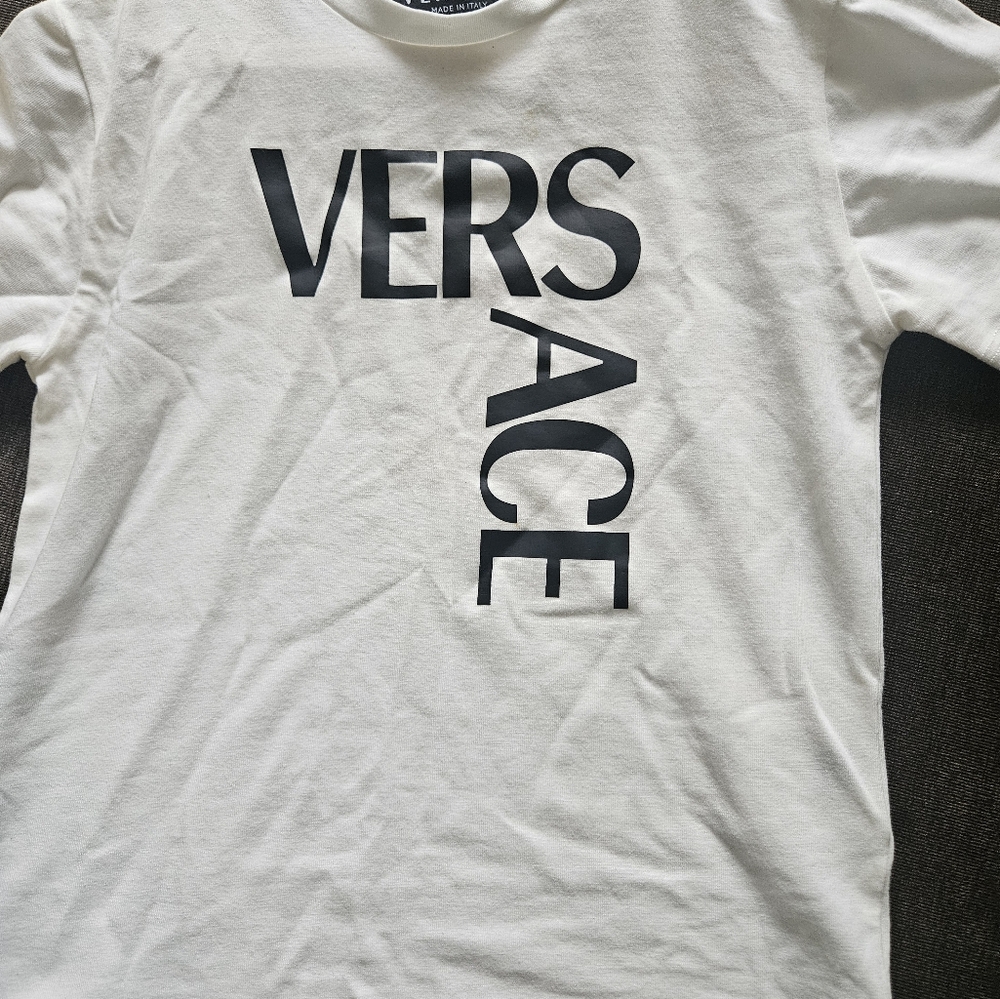 Versace Kids Tee in White with Bold Logo Small Yellowish Stain In Front. - Picture 10 of 13